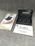 Vintage Kyocera SR-1200 Ii Solar Power Electronic Calculator W/ Box Manual Japan Used. Price: $98.00.