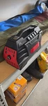 Red Portable Power Station 296WH Outdoor Solar Generator Backup Battery Open. Price: $99.00.