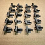 Lot Of 20: Unirac Small Solar Mount End Clamps Dark 302023D (?) Used. Price: $50.00.