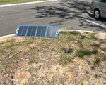 Gosun 100WATT Folding Portable Solar Panel. Kickstand Feet Hanging Grommets Used. Price: $240.00.